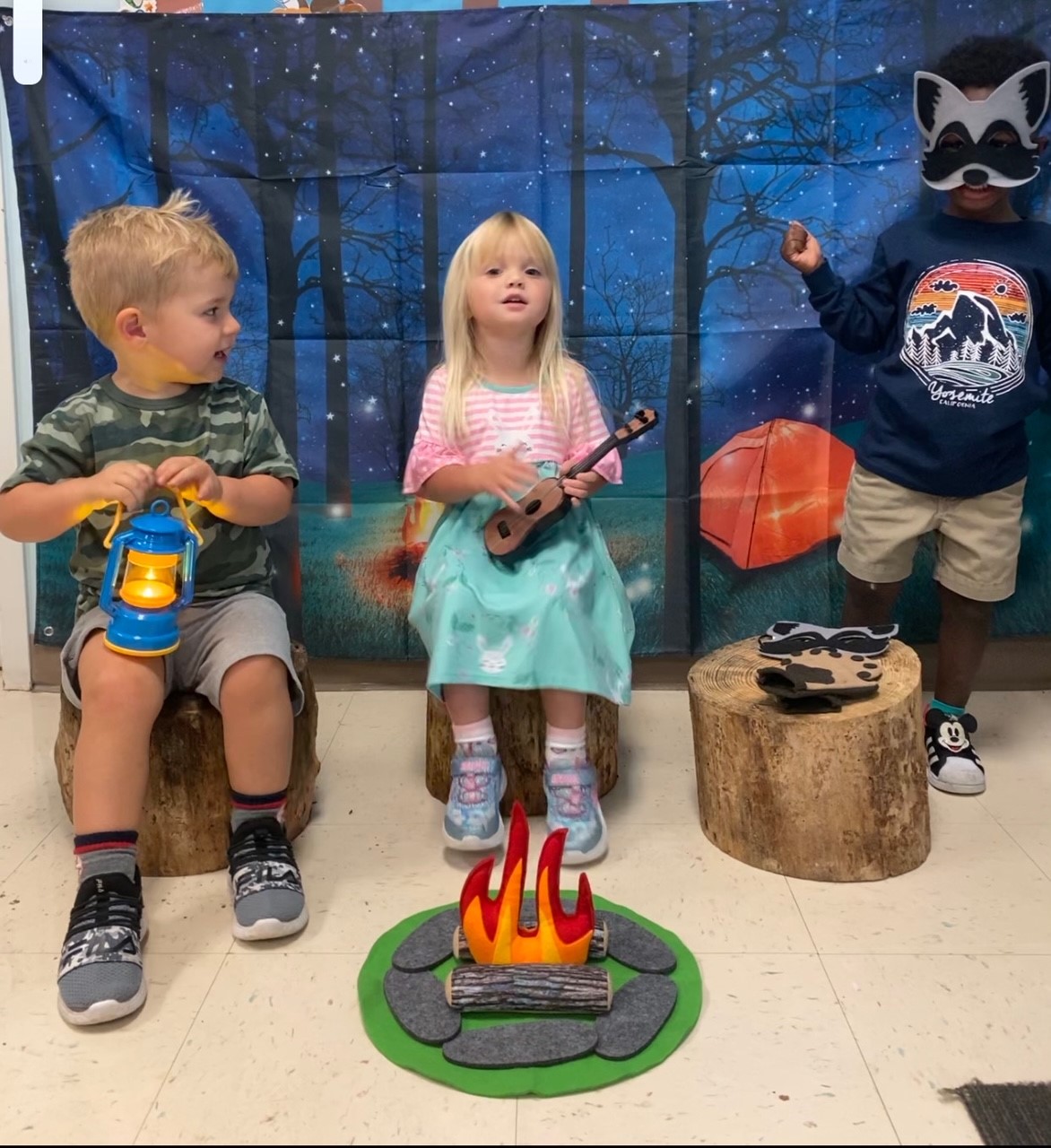 little children camping in their classroom