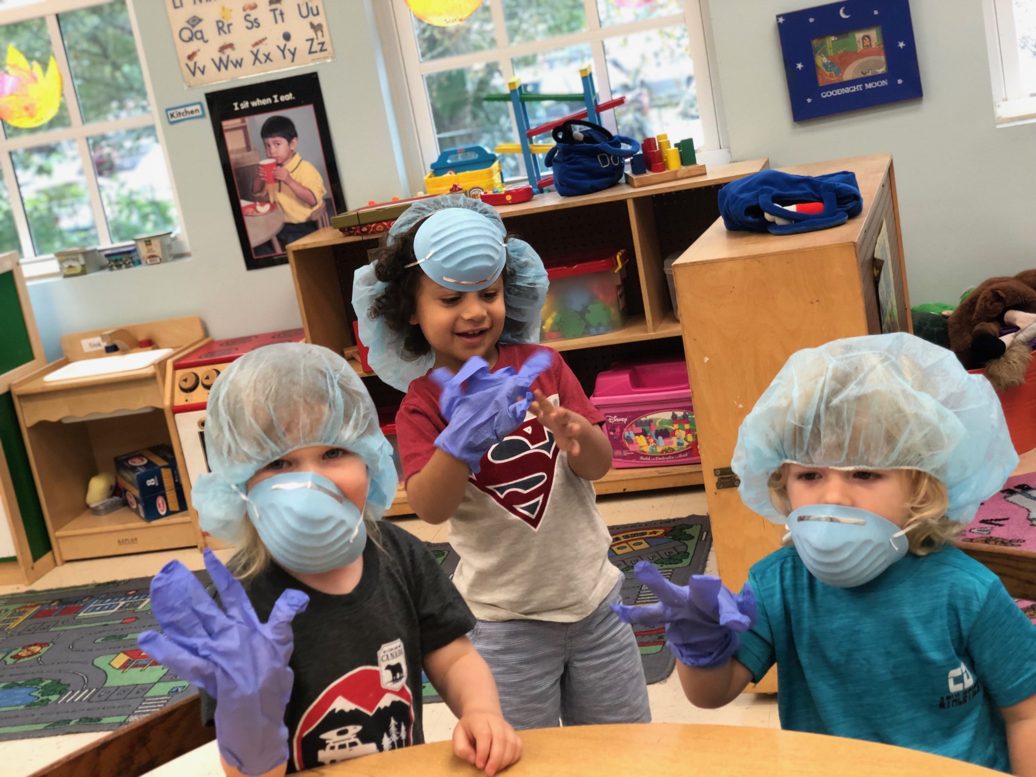 children dressing up as doctors and medical professionals