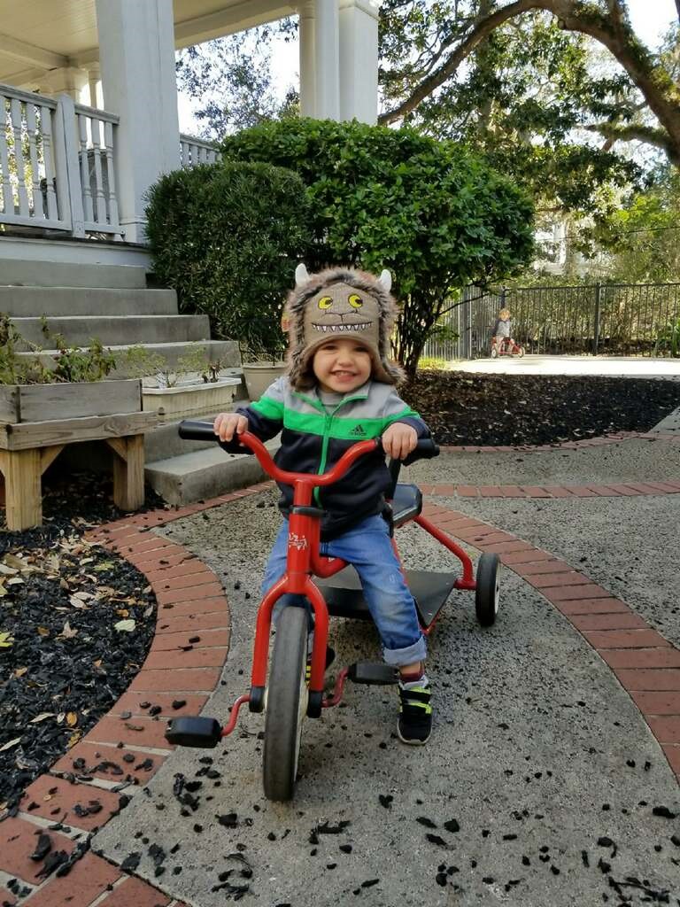 little boy on a bike